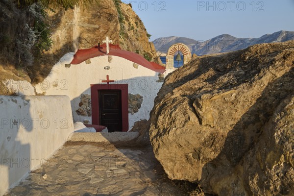 Legend, Crab, Mussel fisherman, Small chapel in a rocky coastal landscape at sunset, Chapel, Little church, Monastery of Agia Kavouradena, Xirokambos, Leros, Dodecanese, Greek Islands, Greece