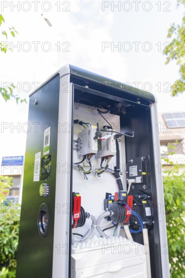 Open-air power installation next to a building and in the open air, installation of a charging station for electric cars, Calw, Germany