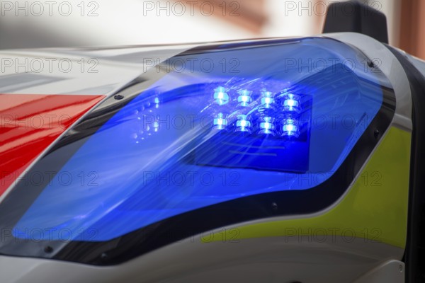 Close-up of a flashing blue light on an ambulance