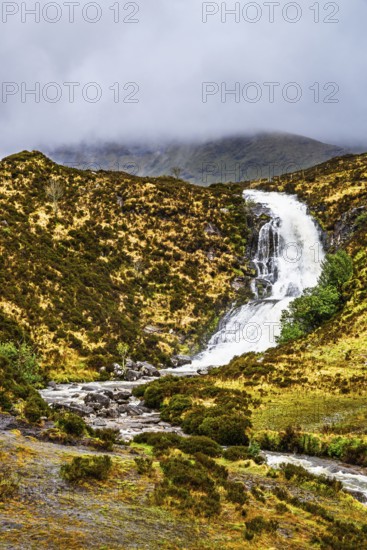 Eas a' Bhradain waterfall, Red Cuillin mountains, Loch Ainort, Isle of Skye, Scotland, UK