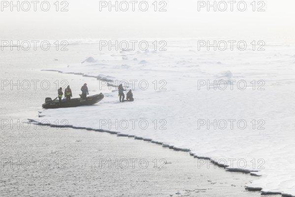 Zodiac with guides lands, Ice Edge, Sea, Spitsbergen, Svalbard