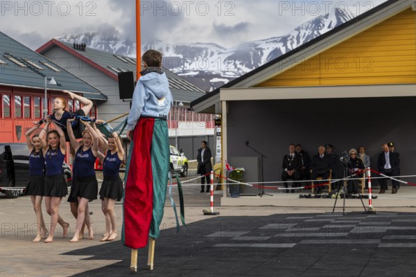 Children's group performing gymnastics at the reception for King Harald at the end of coal mining, portrait, Longyearbyen, Spitsbergen