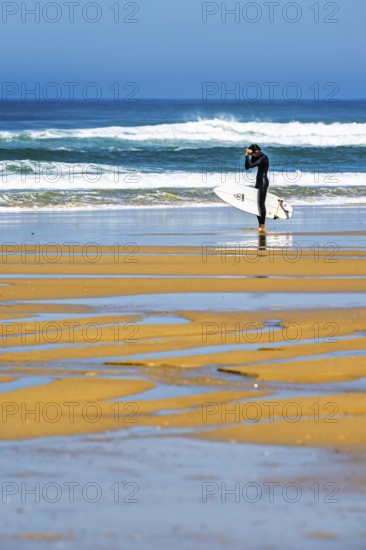 Surfer on Contis beach, Saint Julien en Born, Saint-Julien-en-Born, Landes, France