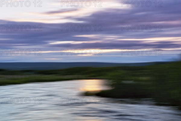 River landscape, evening sky, motion blur, light reflections, text free space, Iceland