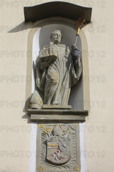 Chapel of St Wolfgang Oberuhldingen, built in 1711, stone figure of St Wolfgang depicted as a Benedictine monk with crosier and mitre, coat of arms unicorn and pelican, statue, relief, district of Oberuhldingen, municipality of Uhldingen-Mühlhofen, Lake Constance district, Baden-Württemberg, Germany