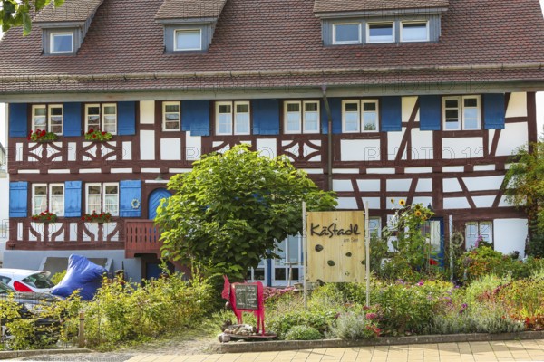 Kässtadel, KäStadel, on the lake, specialist cheese shop with bistro, cheese shop, delicatessen, café, regional cuisine, small restaurant, garden, idyll, still life, half-timbered house, blue wooden shutters, shutters, time out, stop off, Oberuhldingen district, Uhldingen-Mühlhofen municipality, Lake Constance district, Baden-Württemberg, Germany