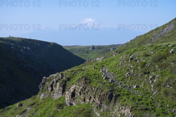 Wide green valley flanked by steep slopes, with Mount Ararat in the background, Our Lady Church with Ararat in the background, Vahramashen Church, Vahramashen Surp Astvatsatsin, Amberd Gorge, Aragazotn Province, Armenia