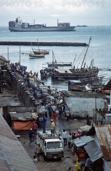 Hustle and bustle in the harbor, container ship, Zanzibar, Tanzania, Africa, June 2000, vintage, retro, old, historic