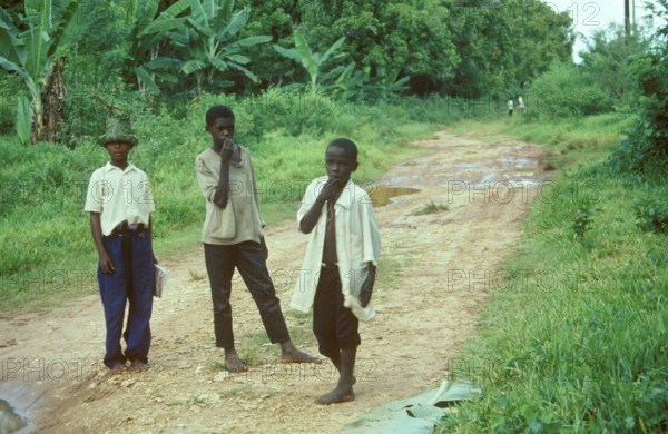 Boys on a dirt road, Zanzibar, Tanzania, Africa, June 2000, vintage, retro, old, historic