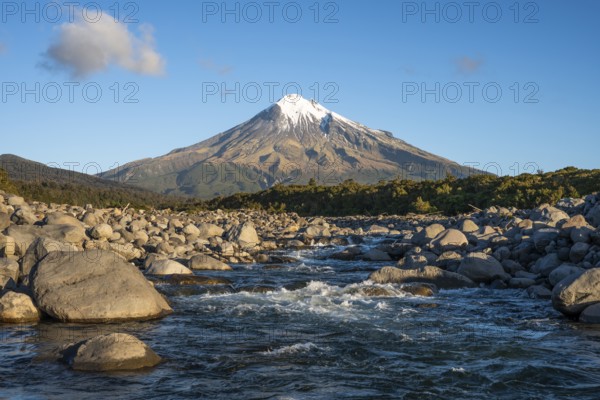 Mount Taranaki, in the foreground Stony River (Hangatahua River) . Egmont National Park, Taranaki Region, North Island, New Zealand