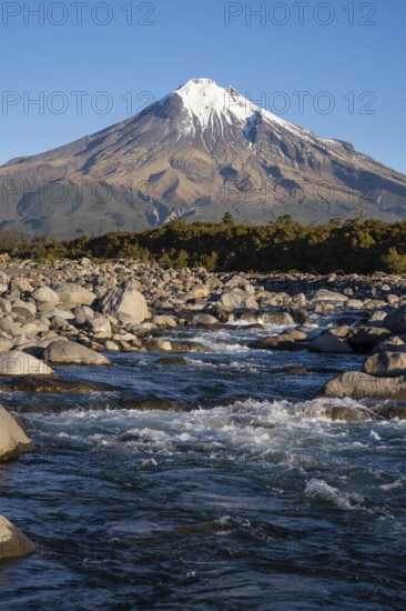 Mount Taranaki, in the foreground Stony River (Hangatahua River) . Egmont National Park, Taranaki Region, North Island, New Zealand