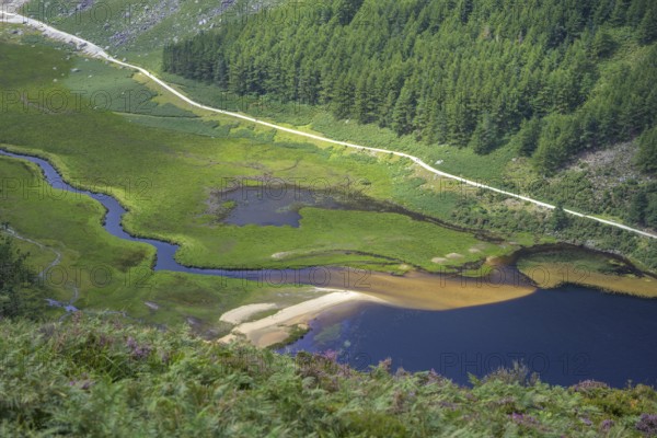 Estuary of mountain stream into Upper Lake, Wicklow Mountains National Park, Glendalough, Brockagh, County Wicklow, Ireland