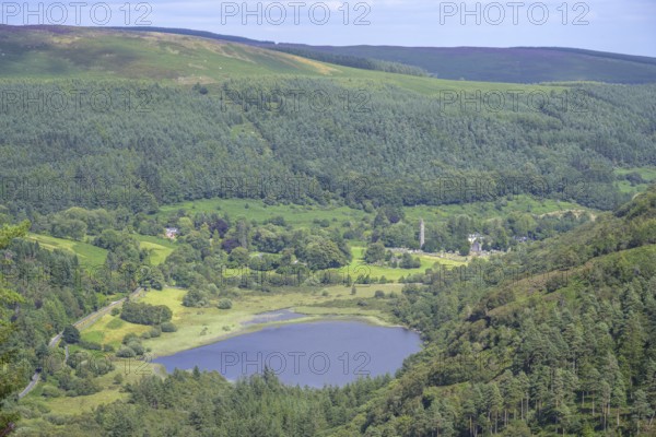 View of Lower Lake and Round Tower, Wicklow Mountains National Park, Glendalough, Brockagh, County Wicklow, Ireland