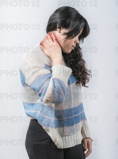 Asian woman with neck pain isolated. Suffering young woman with stress and neck pain