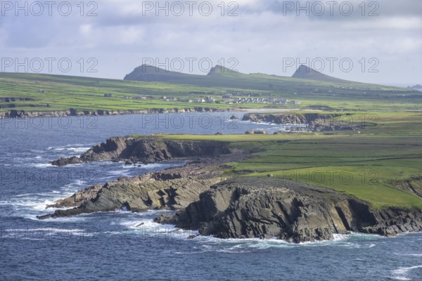 Coast with cliffs in the background An TriÃºr DeirfÃ©ar (The Three Sisters), Clogher, Kerry, Ireland