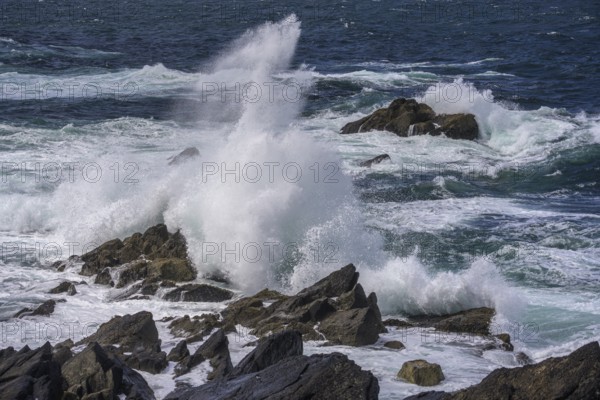 Waves blaze against cliff coast, Dunurlin, Kerry, Ireland
