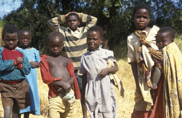 Children posing for the camera on the side of the road, Bwangu Mzimba, Malawi, Africa, June 2000, vintage, retro, old, historical