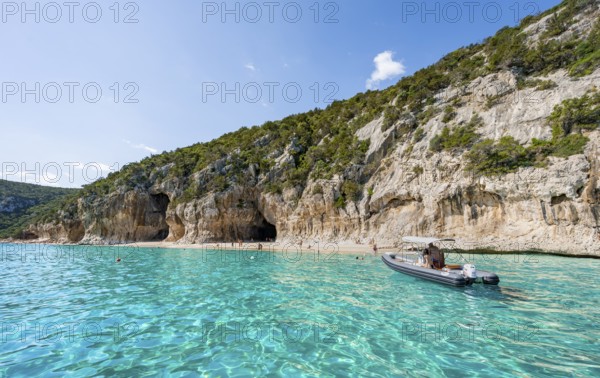 Turquoise clear water and picturesque rocky coast, Cala Luna cliffs and beach, Golfo di Orosei, Baunei, Sardinia, Italy