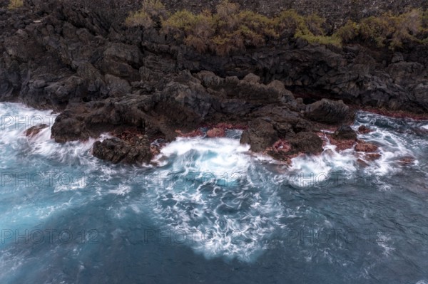 Waves and rocks, coast near Porto Moniz, Madeira, Portugal