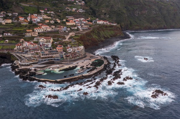 Aerial view, natural swimming pools, natural swimming pools in volcanic rock, lava pools, natural pools, rocky coast, bathing complex, Porto Moniz, Madeira, Portugal