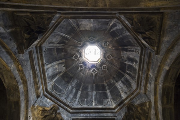 Interior view of a stone dome with vaulted ceilings and central lighting, Haghpat monastery, Haghpatavank, town of Haghpat, UNESCO World Heritage Site, Lorikeet province, Armenia