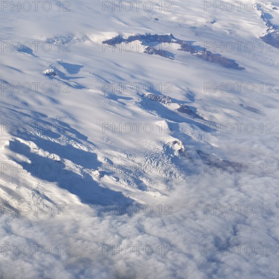 View of glaciers, structures, rocks in ice, snowfields, aerial view, Icelandic highlands, Iceland