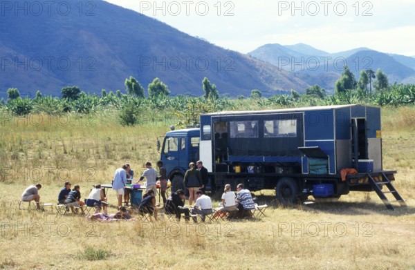 Participants of an overland safari during their lunch break, Malawi, Africa, June 2000, vintage, retro, old, historic