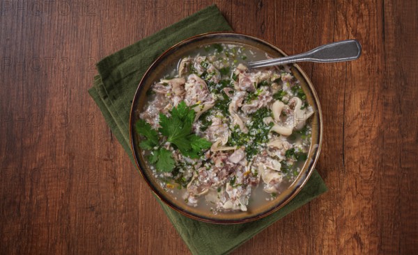 Muzhuzhi, a Georgian dish made from pork legs, with spices and herbs, homemade