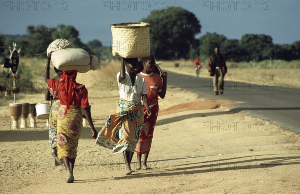 Women with payloads, Malawi, Africa, June 2000, vintage, retro, old, historic