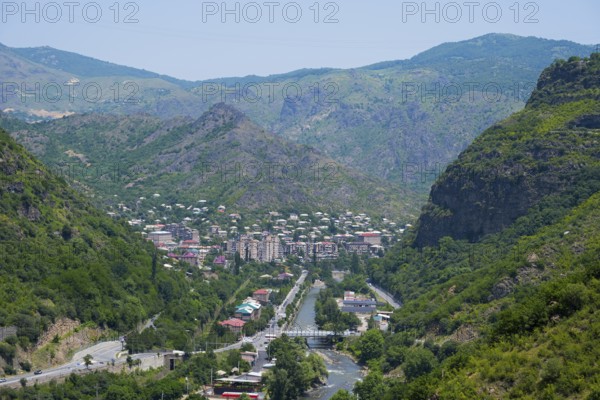 Mountain landscape with a town in the valley surrounded by lush greenery and a river flowing through it, Alaverdi, Alaverdi, Debed River, Lorikeet Province, Armenia