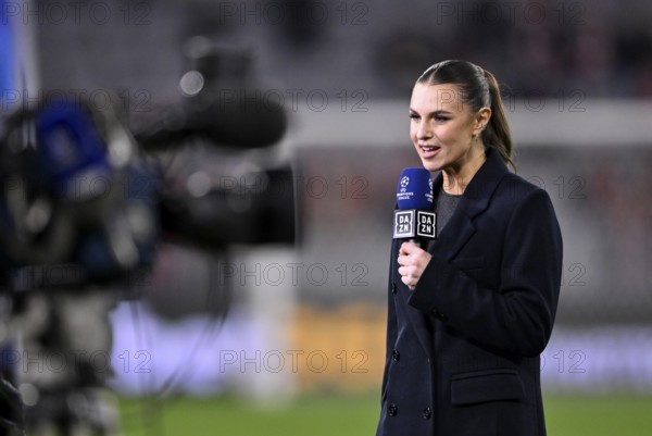 DAZN presenter Laura Wontorra with microphone, logo, Champions League, Allianz Arena, Munich, Bavaria, Germany