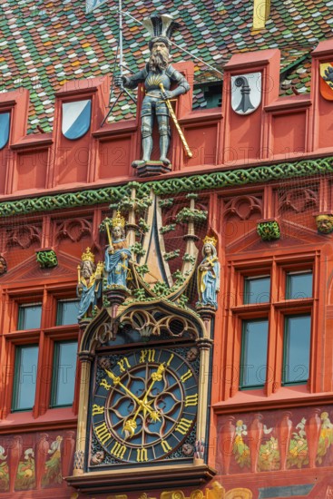 Exterior view of the magnificent clock at the Red Town Hall, Market Square, Basel