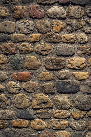 Historic wall with paving stones as texture