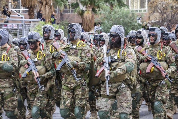 Damascus, Syria â€“ December 08, 2025: A military parade by Syrian army units marking the first anniversary of liberation and the change of Assad's regime, held in Umayyad Square in central Damascus, attended by thousands of people, Damascus, Damascus, Syria