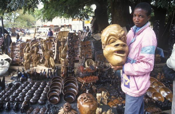 Artist, woodcarving stand at Lilongwe market, Malawi, Africa, June 2000, vintage, retro, old, historic