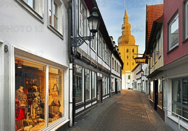 Great St. Mary's Church at sunrise at the end of Gasse Helle Halle, Lippstadt, North Rhine-Westphalia, Germany