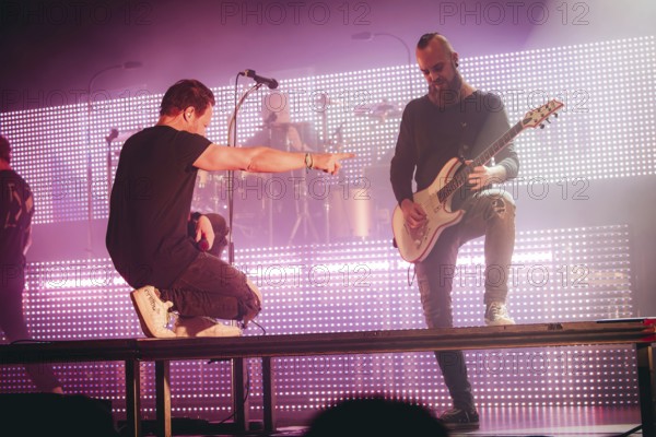 Singer Christoph von Freydorf and guitarist Andy buck from Emil Bulls live on X-Mas Bash Tour 2025 at Huxleys Neue Welt in Berlin on 05.12.2025