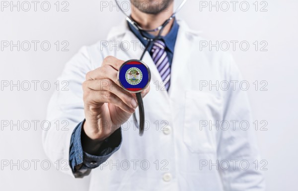 Belize healthcare system, doctor holding stethoscope. Belize health and medical insurance concept