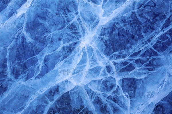 Close-up of blue ice, made of compressed snow, structure showing cracks and fissures inside glacier, Spitsbergen / Svalbard, Norway