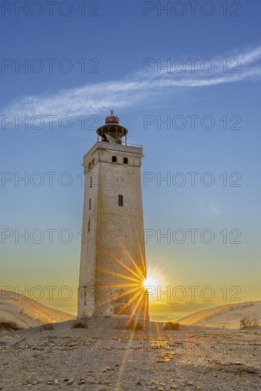 Rubjerg Knude Fyr / Rubjerg Knude lighthouse in the sand dunes on the top of LÃ¸nstrup Klint at dawn, HjÃ¸rring, North Jutland, Denmark