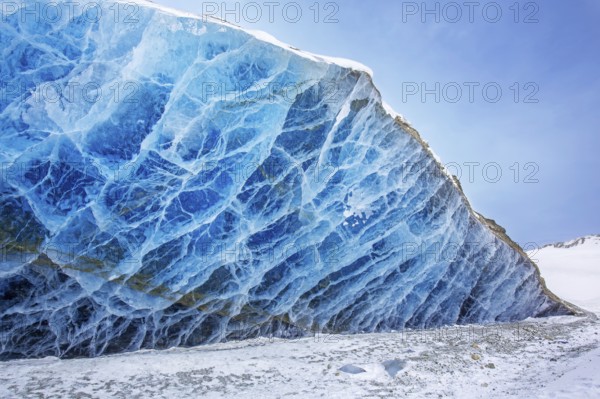 Glacier wall showing smooth melting blue ice made of compressed snow, Spitsbergen / Svalbard, Norway