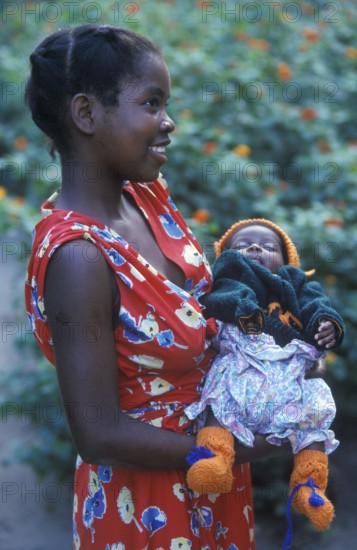 Portrait of a proud young mother with her newborn baby, Kande, Malawi, Africa, July 2000, vintage, retro, old, historic