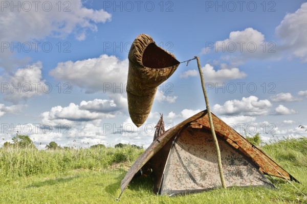 Camp of a nature photographer, pictorial representation of wind, windsock, Peenetal nature park Park, Mecklenburg-Western Pomerania, Germany