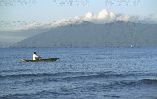 Man in dugout, Malawi Sea, Kande, Malawi, Africa, July 2000, vintage, retro, old, historic