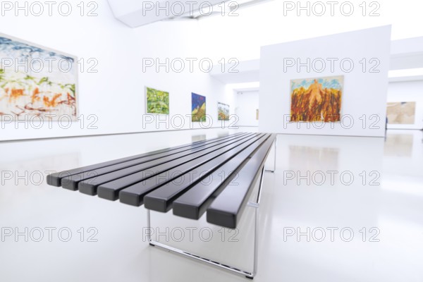 Modern works of art in a bright gallery with minimalistically designed bench, Open Horizons exhibition, Schauwerk Sindelfingen, Böblingen district, Germany