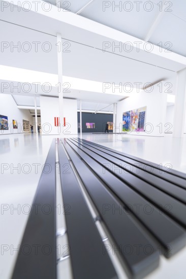 Minimalist bench in a modern gallery with works of art, flooded with light, Open Horizons exhibition, Schauwerk Sindelfingen, Böblingen district, Germany