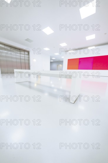 Empty, bright room with white bench and colored painting on the wall, Open Horizons exhibition, Schauwerk Sindelfingen, BÃ¶blingen district, Germany