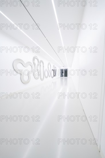 A bright, narrow corridor with artistic wall decorations in modern style, Open Horizons exhibition, Schauwerk Sindelfingen, BÃ¶blingen district, Germany