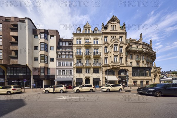 Row of houses, general architecture, modern buildings, historic buildings, residential buildings and commercial buildings, taxi stand, taxi, retail stores, former hotel palace hotel, grocery store Family Nuts, modern versus historical architecture, contrast, blue sky, overcast sky, cirrostratus clouds, cumulus clouds, Kranzplatz street, Wiesbaden, state capital, district-free city, Hesse, Germany