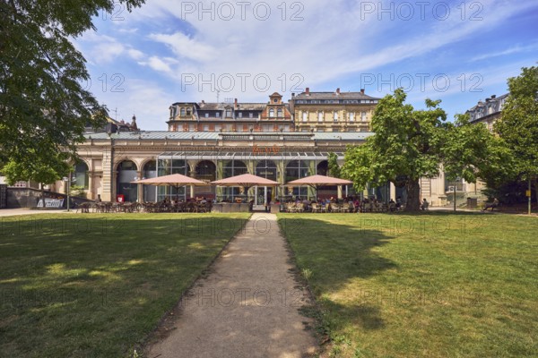 Café, system catering, Cafe Del Sol, historic building, hall, colonnades, parks, trees, lawn, paths, blue sky, cumulus clouds, cirrus clouds, Kochbrunnenplatz, Wiesbaden, state capital, district-free city, Hesse, Germany